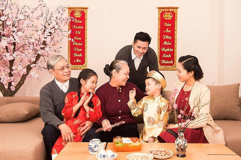 Đi ch&uacute;c Tết tiếng Anh l&agrave; &ldquo;pay New Year&rsquo;s visit&rdquo;. (Ảnh: Sưu tầm Internet)