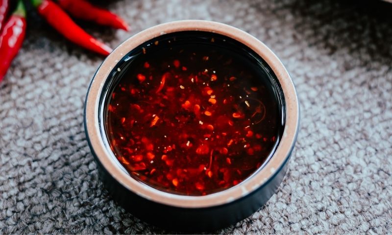 Đồ ăn cay nóng không tốt cho dạ dày của mẹ. ( Nguồn: Internet)